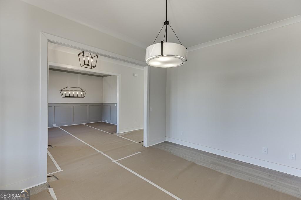 5470 Settingdown Road Cumming, GA 30028 - Photo 5 of 46 a view of kitchen and chandelier