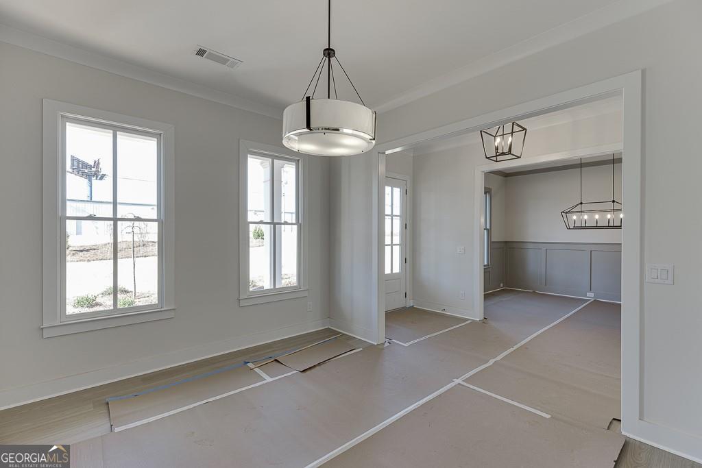 5470 Settingdown Road Cumming, GA 30028 - Photo 6 of 46 a view of an empty room with a window