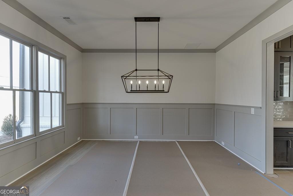 5470 Settingdown Road Cumming, GA 30028 - Photo 7 of 46 a view of an empty room with a window