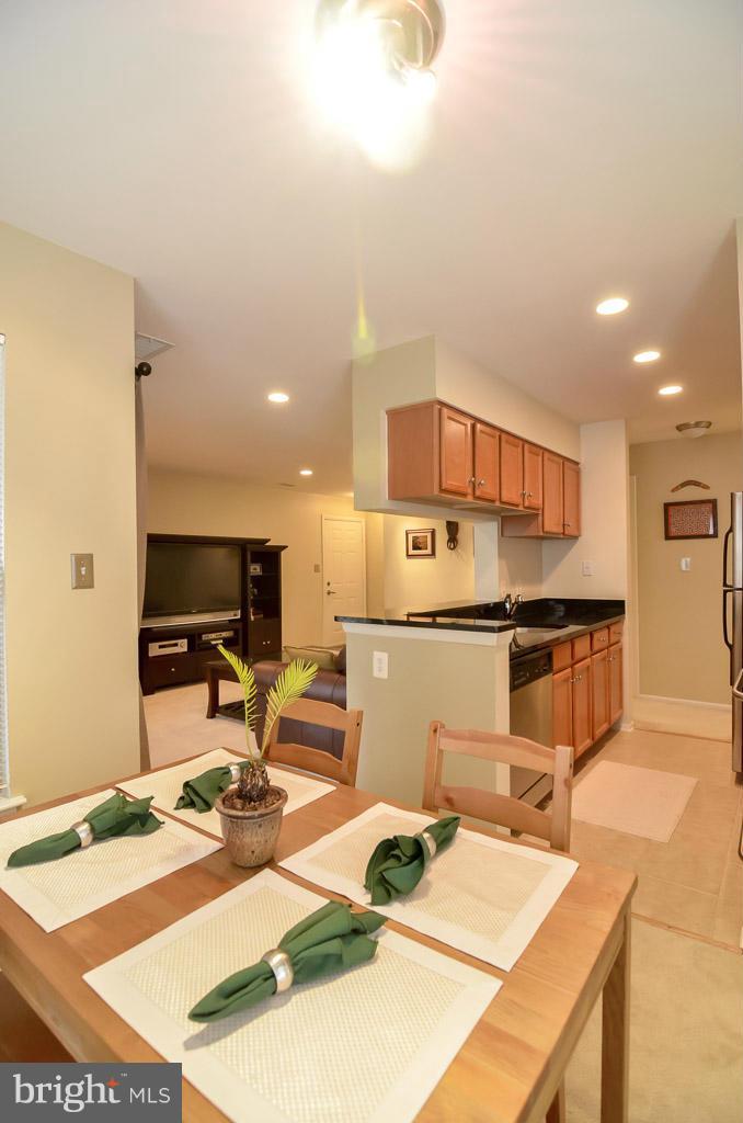 1781 Jonathan Way, Unit F Reston, VA 20190 - Photo 15 of 28 Dining Room Looking into the Kitchen