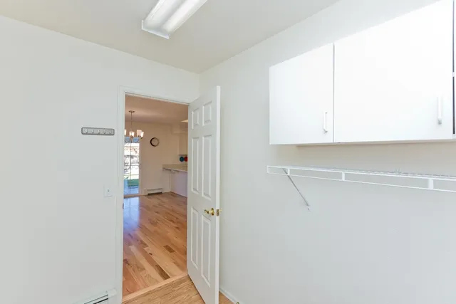a view of a bathroom with a glass shower door