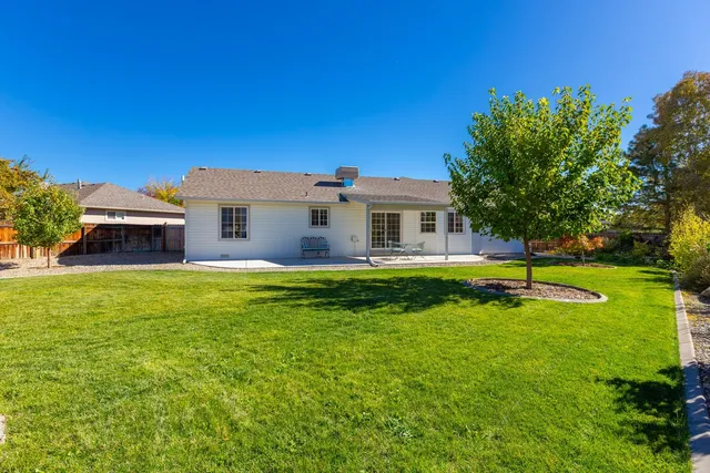 a view of house with a swimming pool