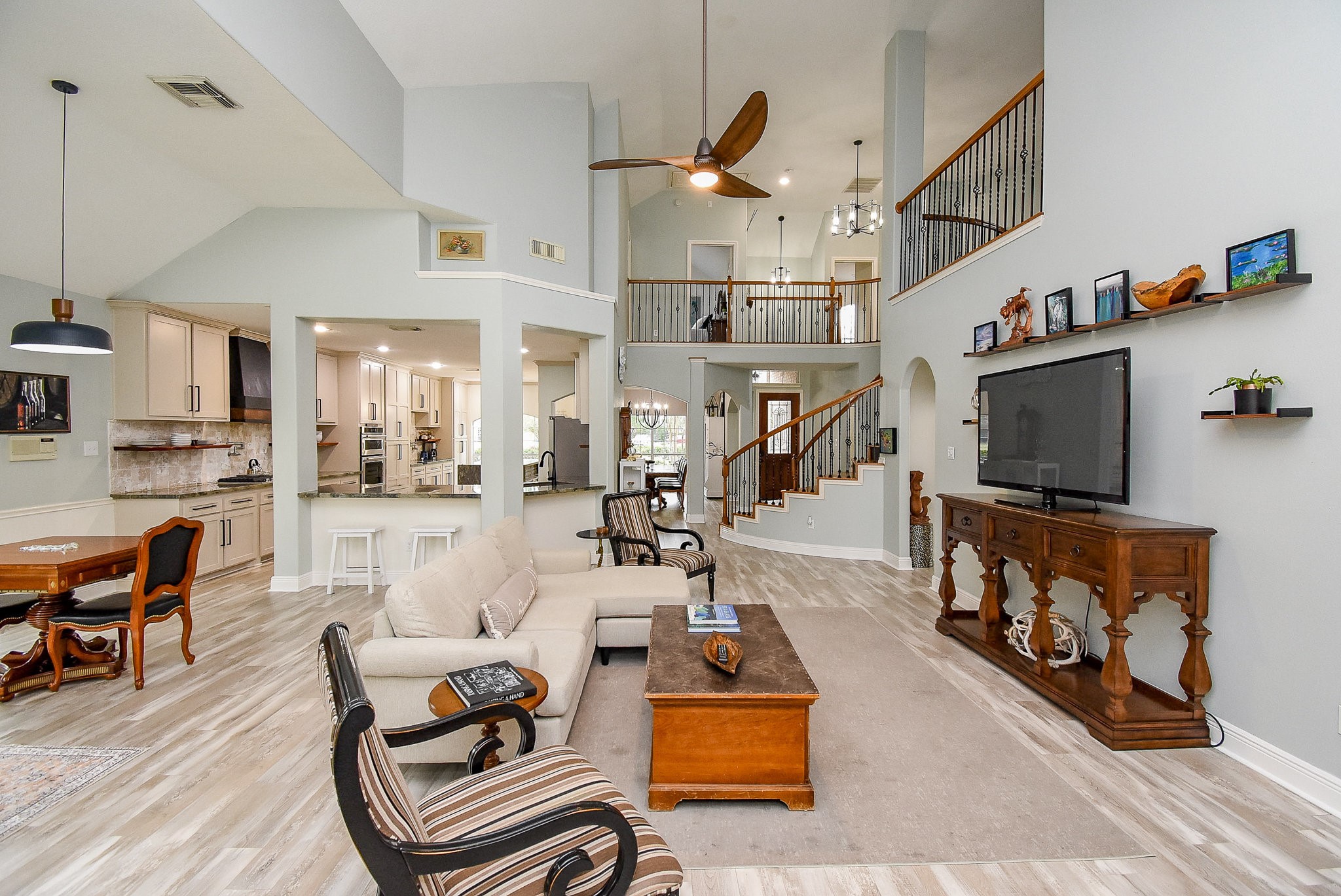 30518 Aldine Westfield Road Spring, TX 77386 - Photo 19 of 50 a living room with furniture and a flat screen tv