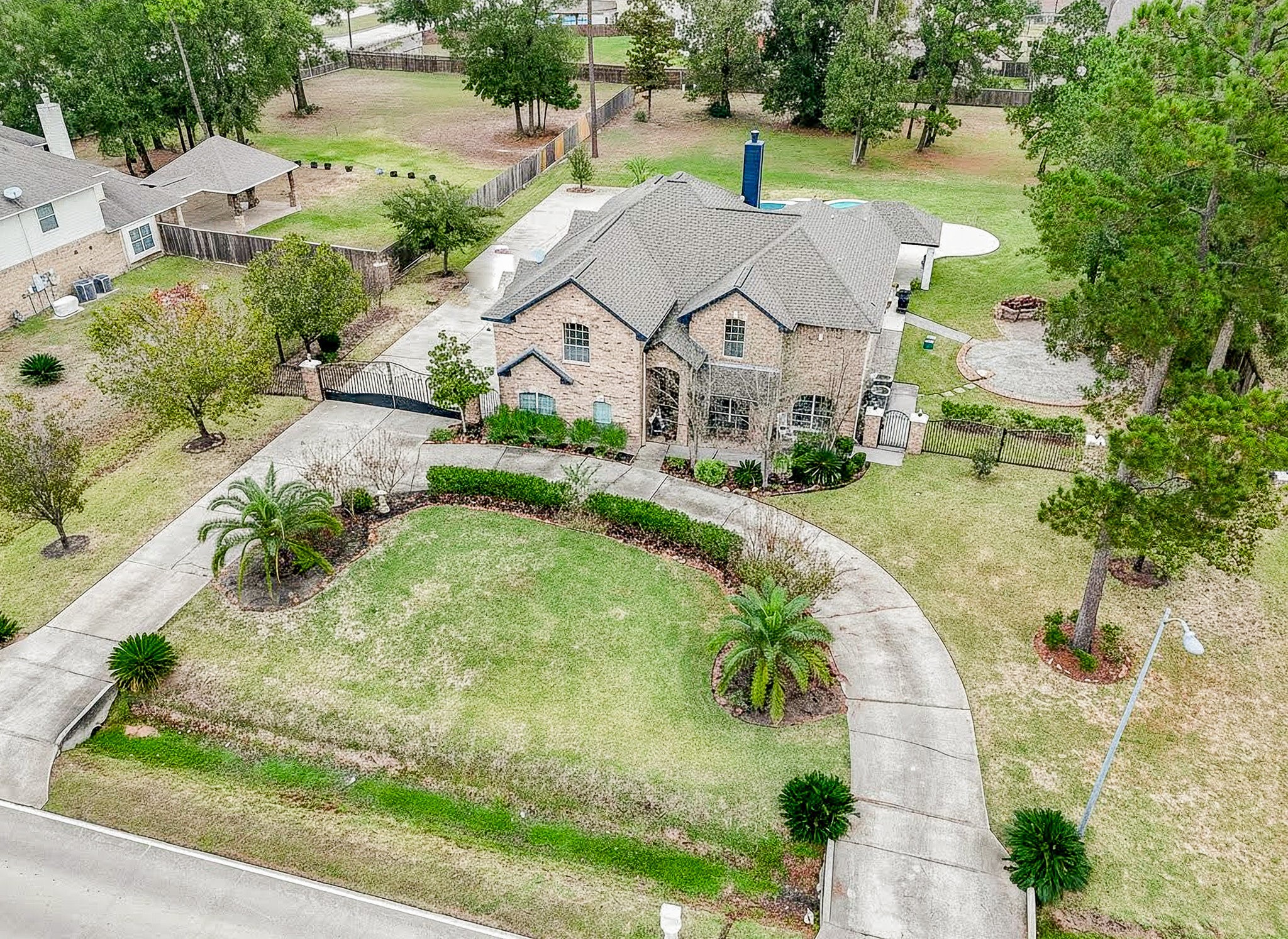 30518 Aldine Westfield Road Spring, TX 77386 - Photo 2 of 50 a aerial view of a house with a yard and lake view