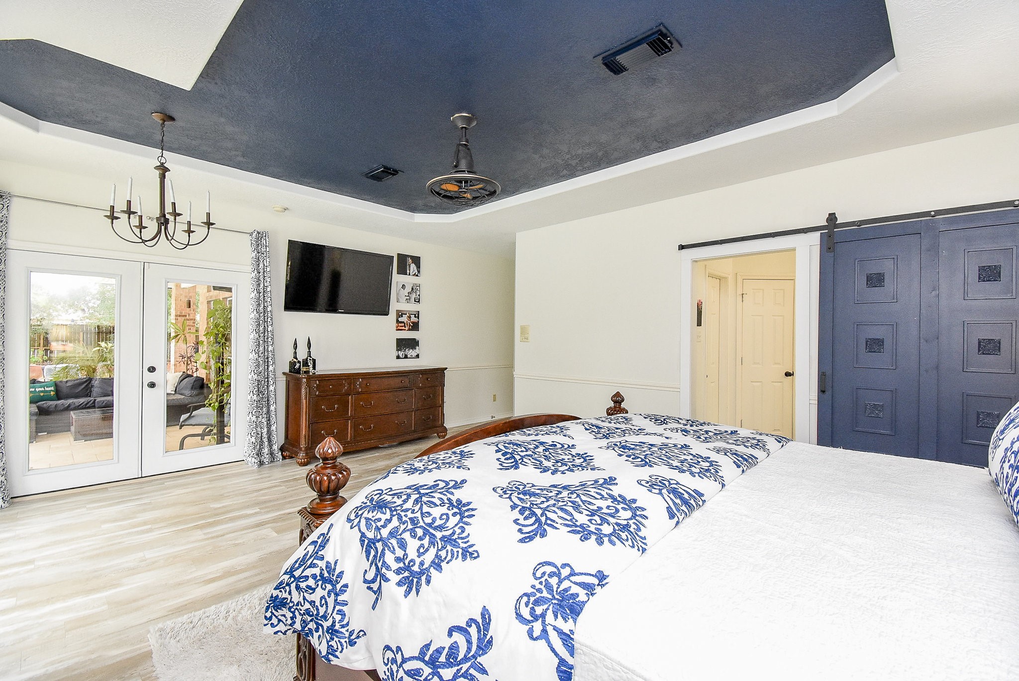 30518 Aldine Westfield Road Spring, TX 77386 - Photo 23 of 50 a bedroom with a bed and a flat screen tv