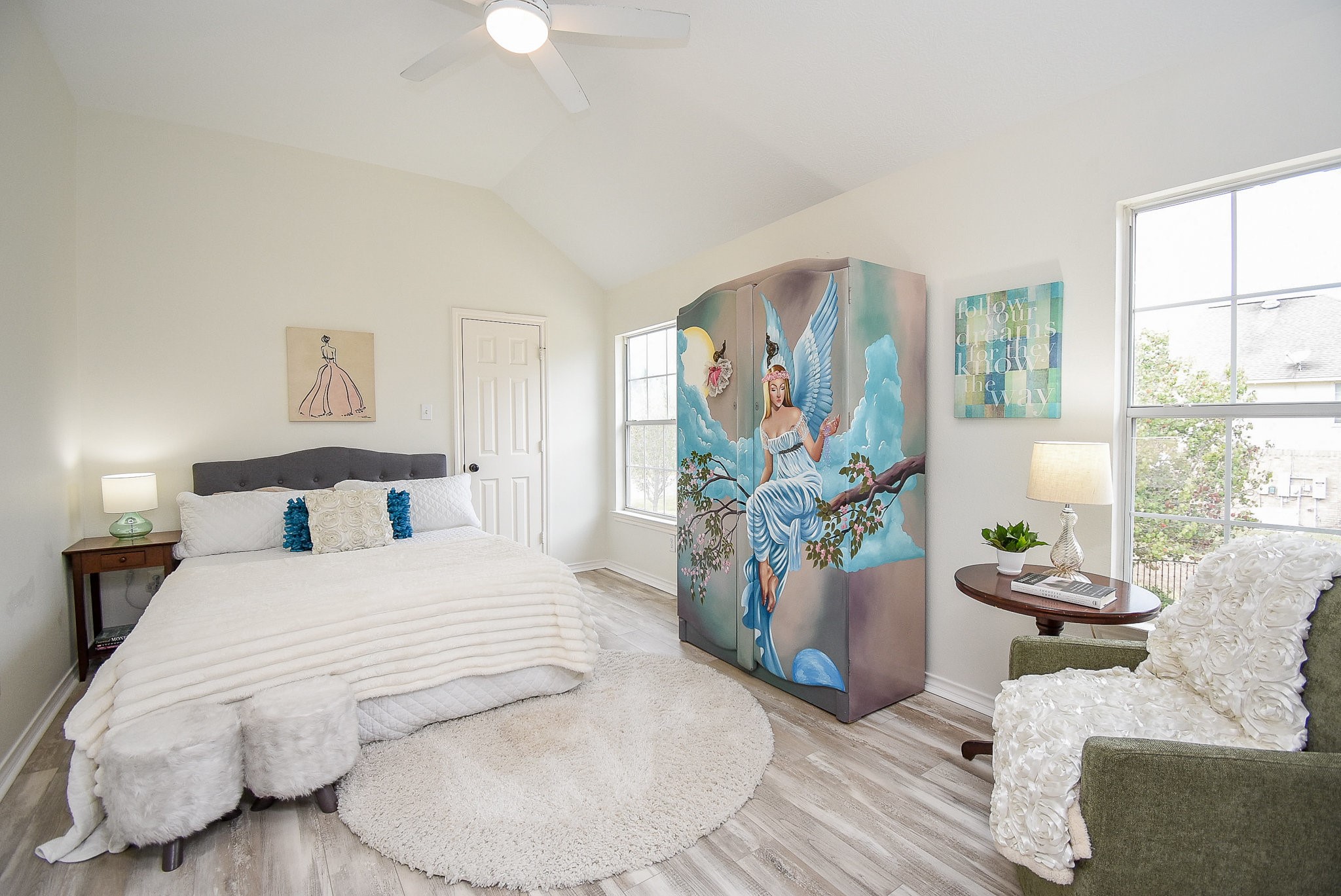 30518 Aldine Westfield Road Spring, TX 77386 - Photo 31 of 50 a bedroom with a large bed and a potted plant