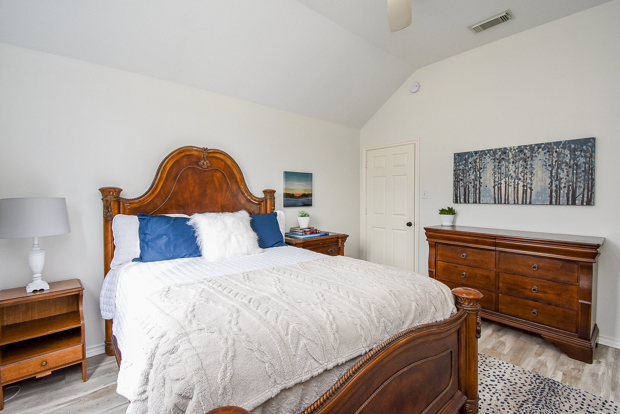 30518 Aldine Westfield Road Spring, TX 77386 - Photo 34 of 50 a bedroom with a bed and a dresser