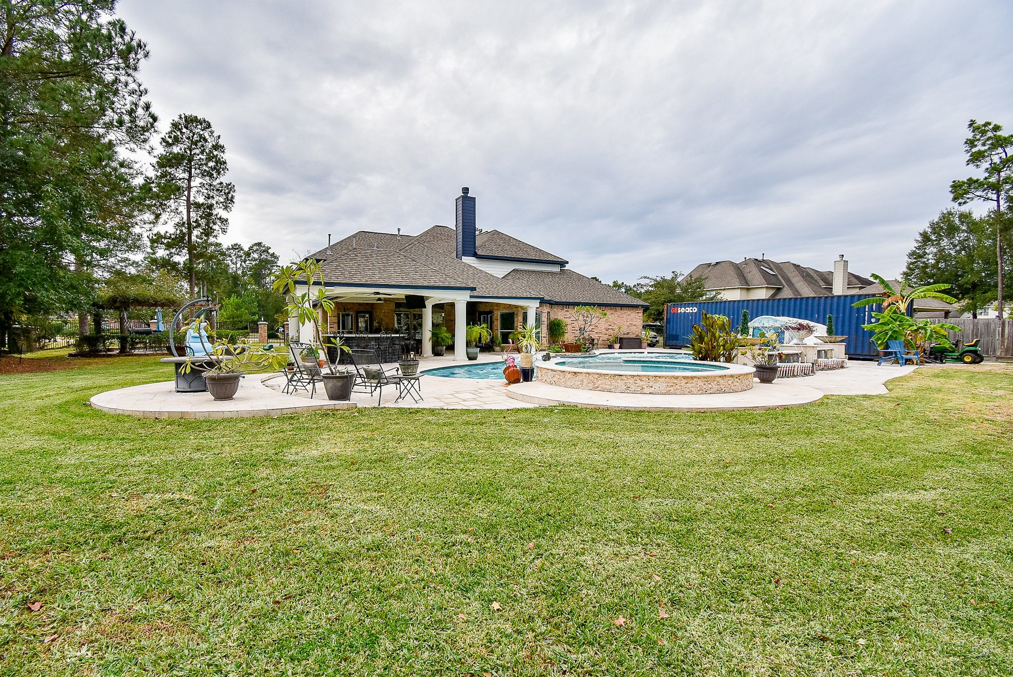 30518 Aldine Westfield Road Spring, TX 77386 - Photo 45 of 50 a swimming pool view with a garden and plants