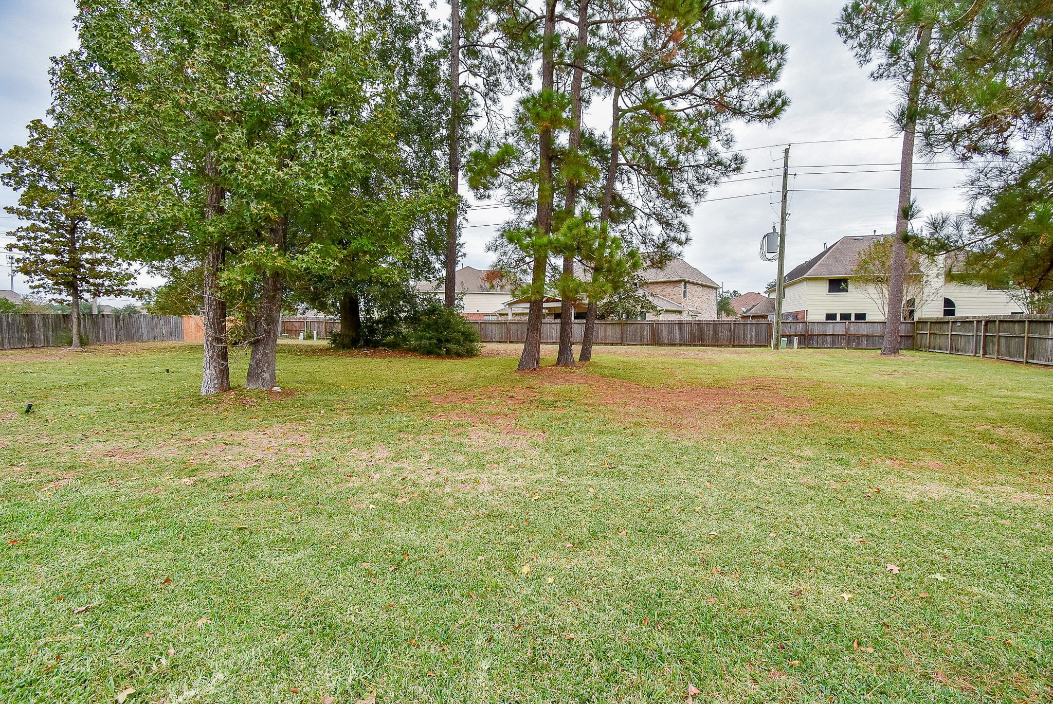 30518 Aldine Westfield Road Spring, TX 77386 - Photo 46 of 50 a view of a street with a building and trees in the background