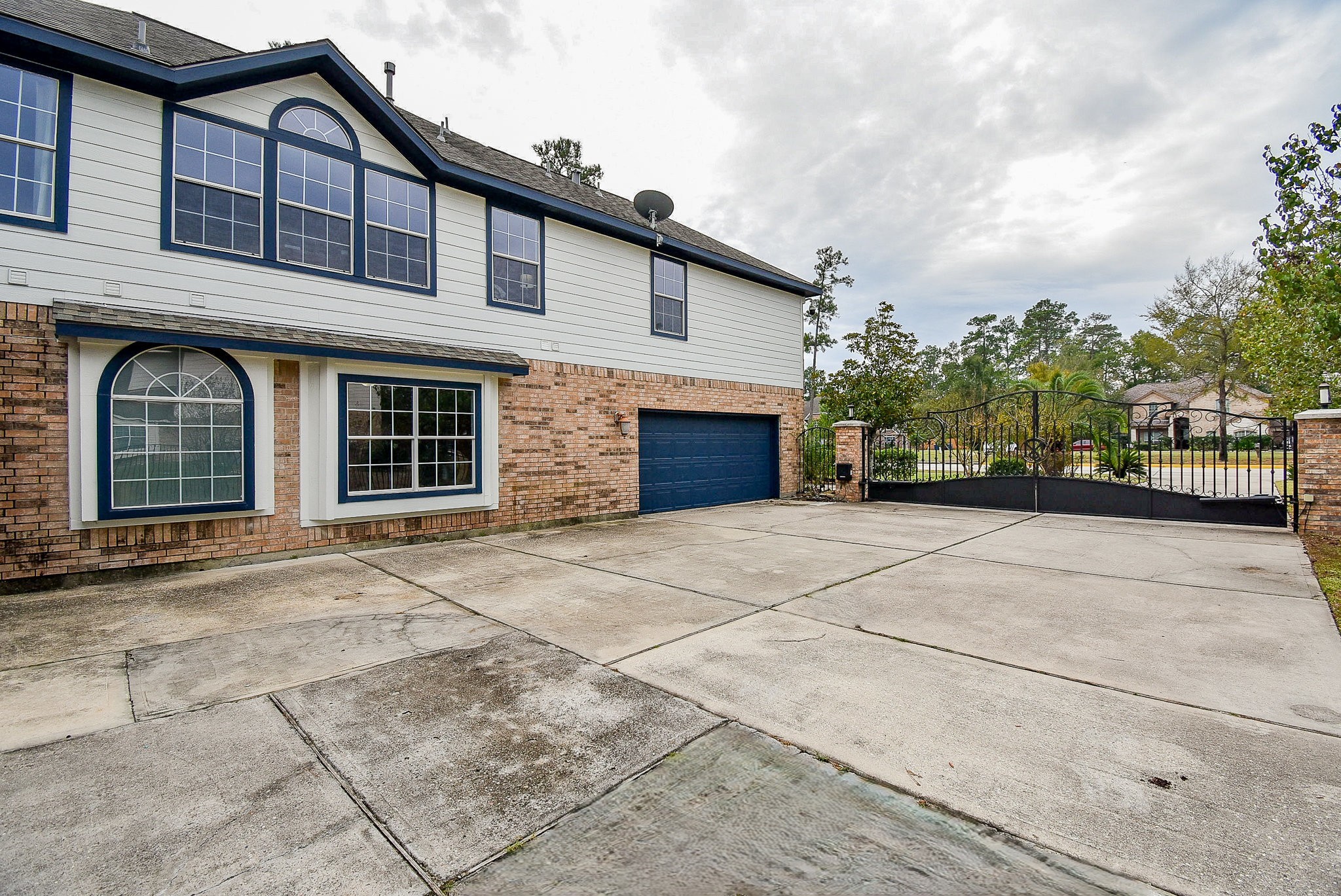 30518 Aldine Westfield Road Spring, TX 77386 - Photo 50 of 50 a front view of a house with a yard and garage