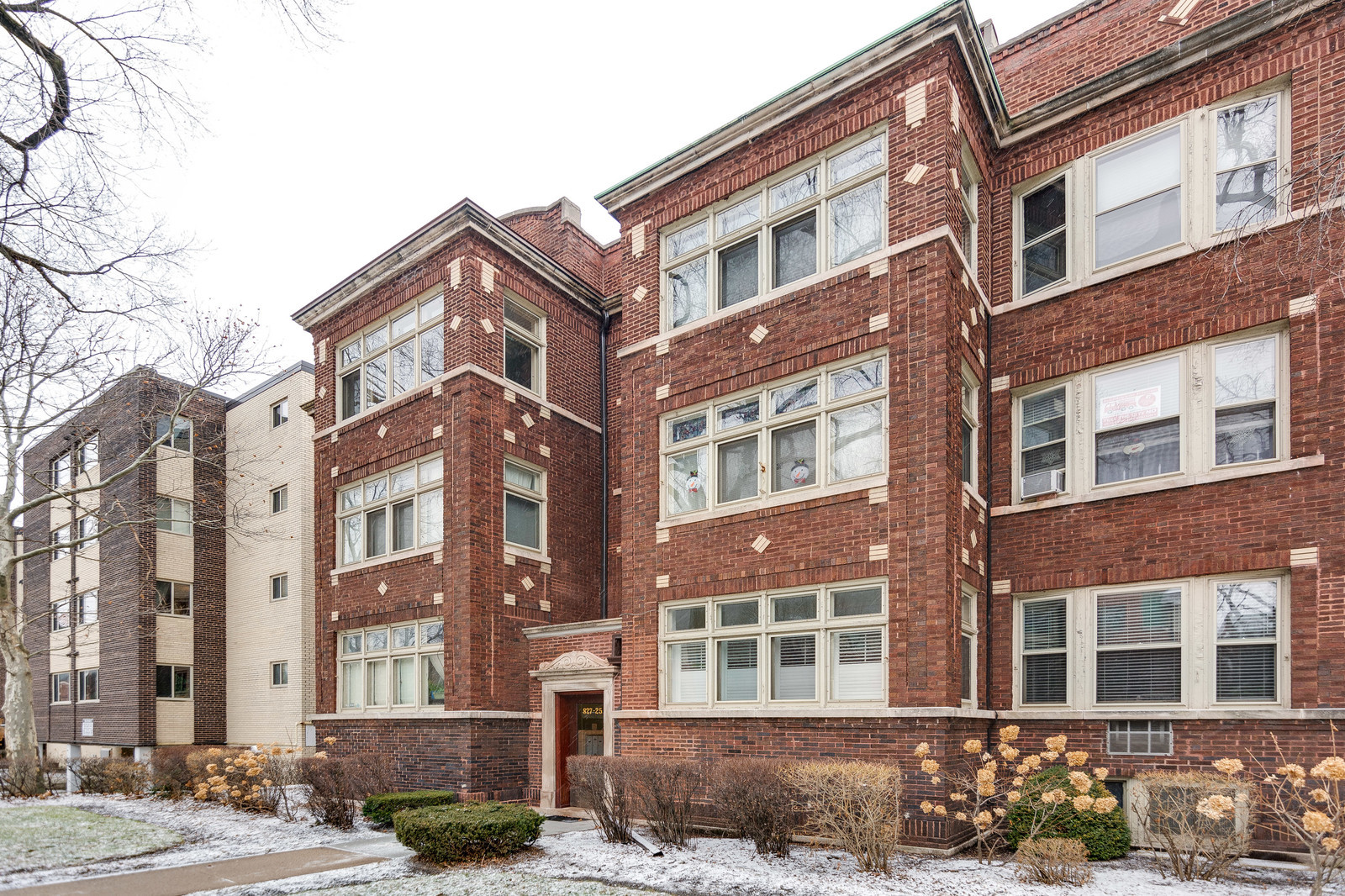827 Ridge Avenue, Unit 2 Evanston, IL 60202 - Photo 1 of 1 a front view of a building with lot of cars