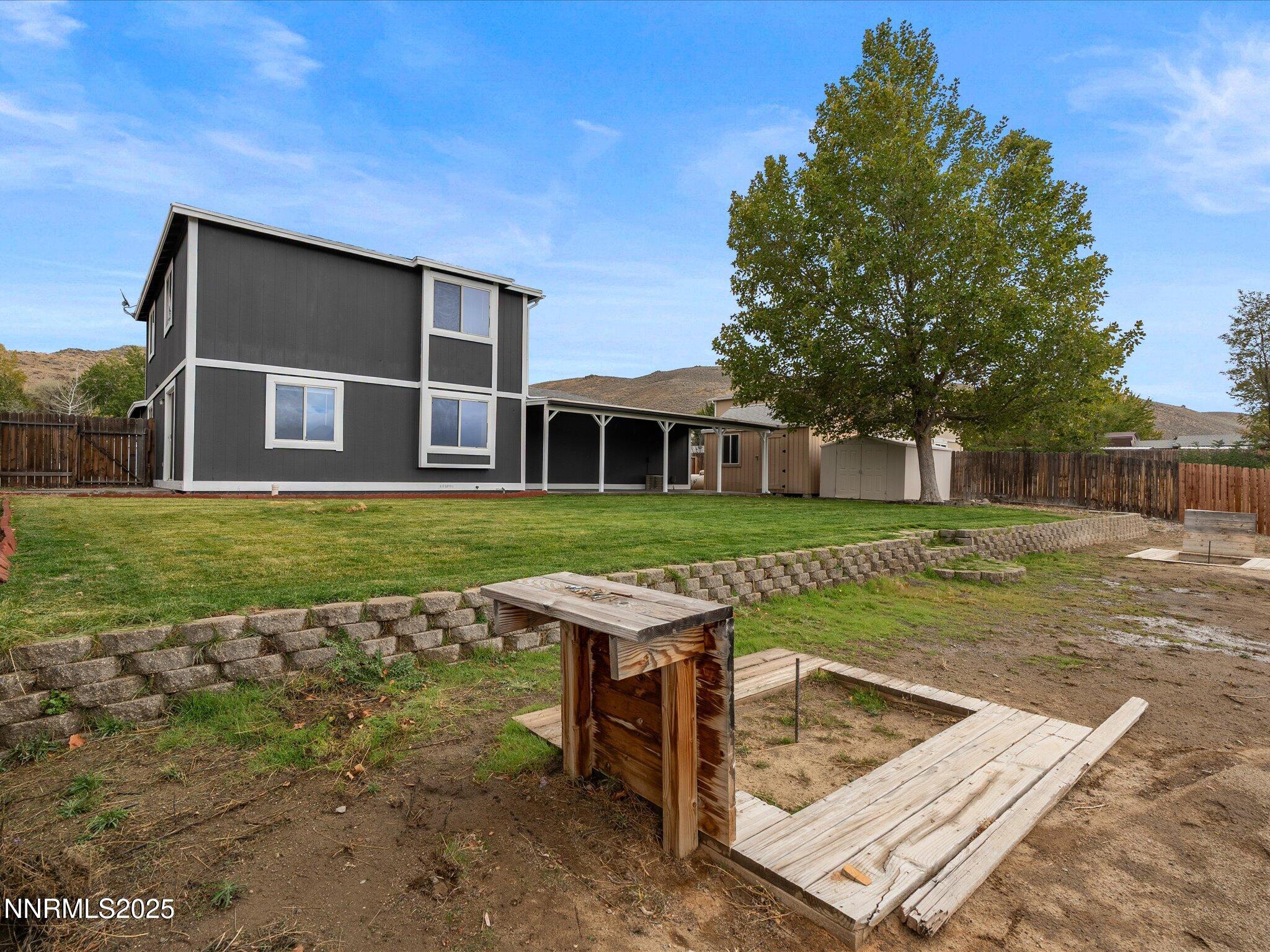 5005 Azurite Drive Reno, NV 89508 - Photo 24 of 33 front view of a house with a yard