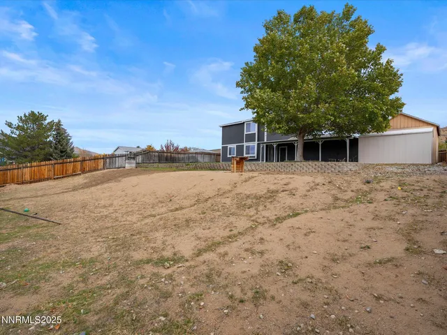 a view of a garden with trees