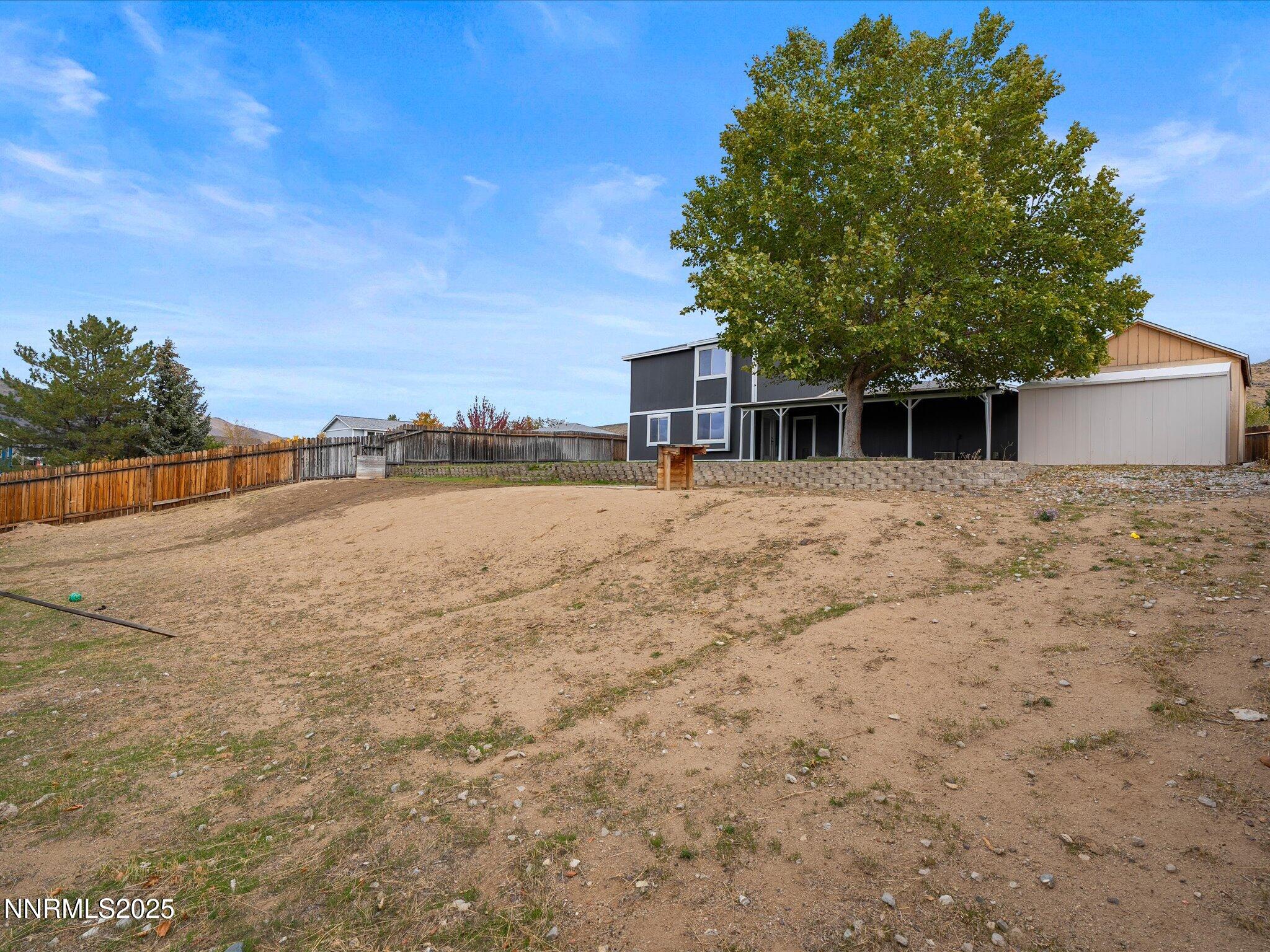 5005 Azurite Drive Reno, NV 89508 - Photo 29 of 33 a house with trees in front of it