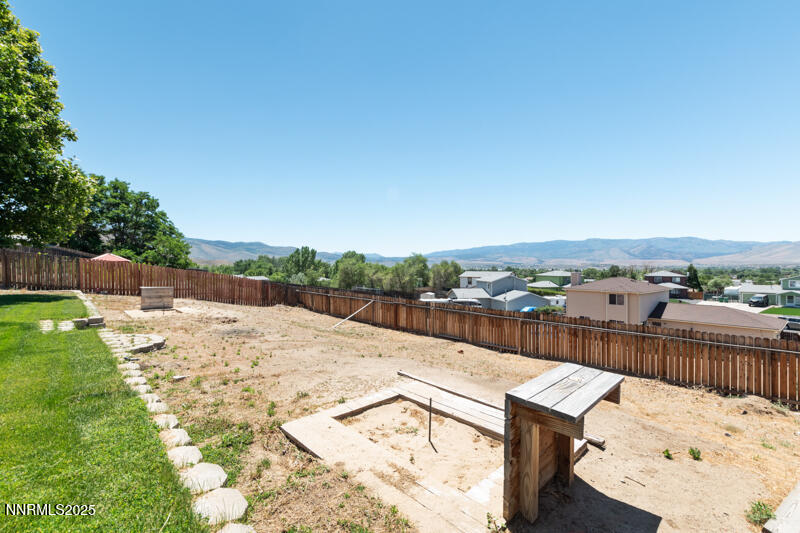 5005 Azurite Drive Reno, NV 89508 - Photo 32 of 33 a view of a terrace with a yard