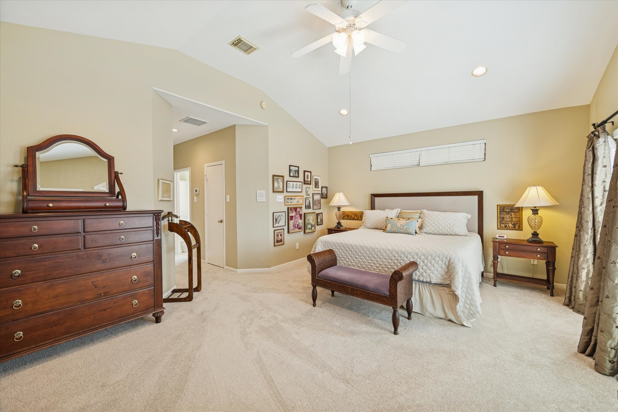 210 Malone Street Houston, TX 77007 - Photo 25 of 35 a bedroom with a bed and a dresser