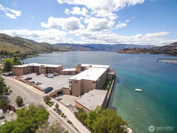 a view of a terrace with lake view and mountain view