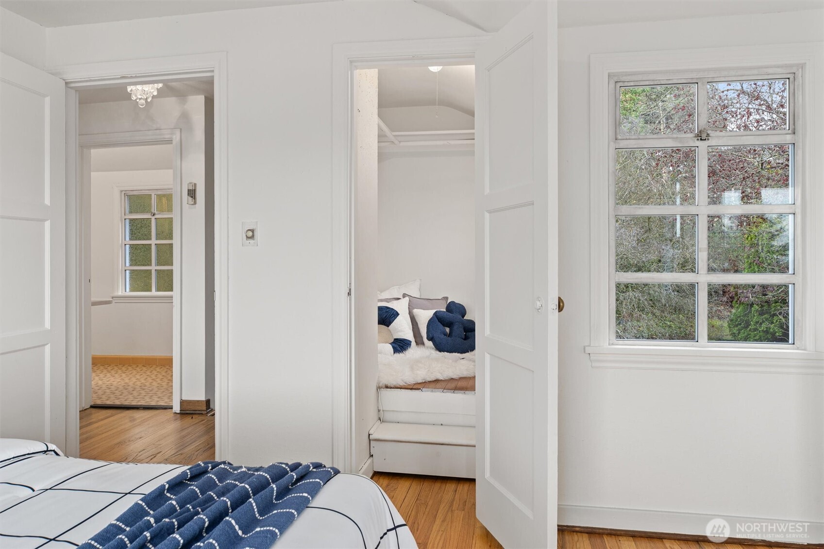 1820 Magnolia Way West Seattle, WA 98199 - Photo 15 of 33 a bedroom with a bed and a window