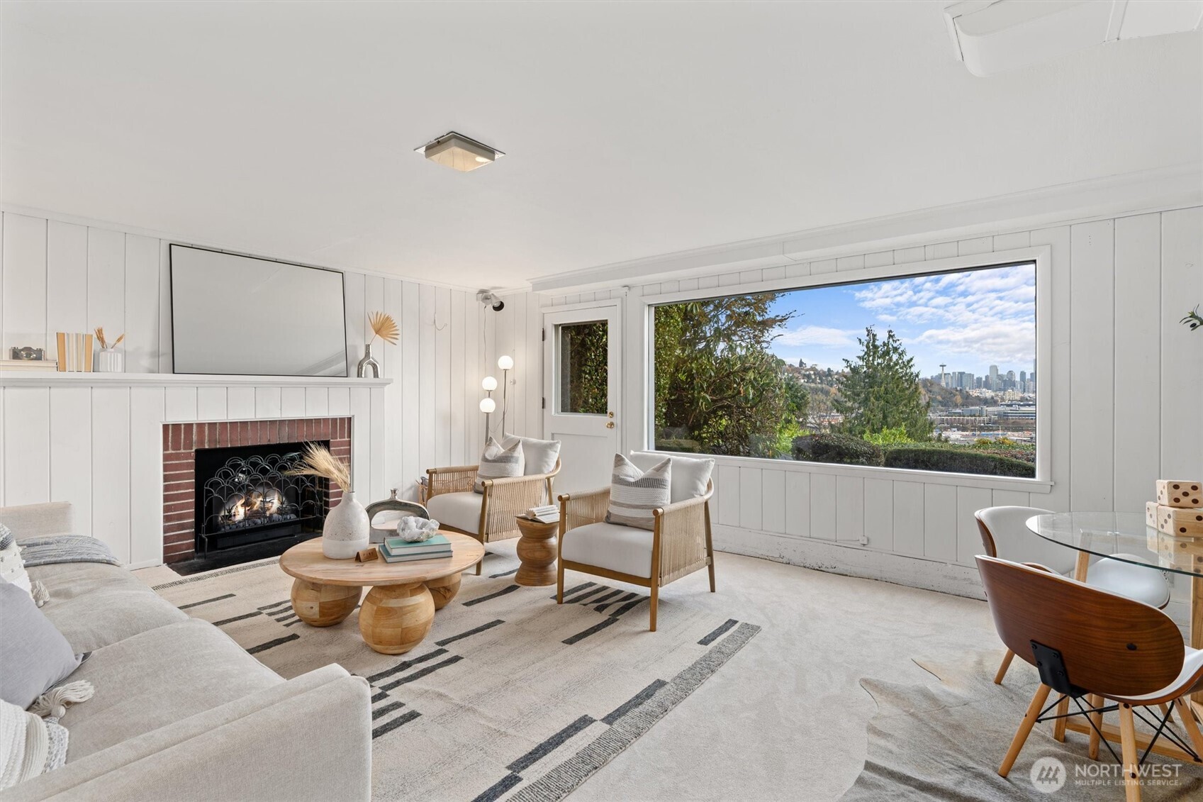 1820 Magnolia Way West Seattle, WA 98199 - Photo 22 of 33 a living room with furniture and a fireplace