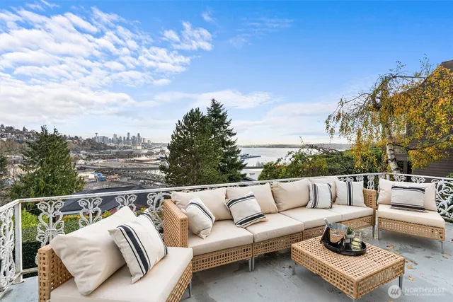 a view of a kitchen with sink and window