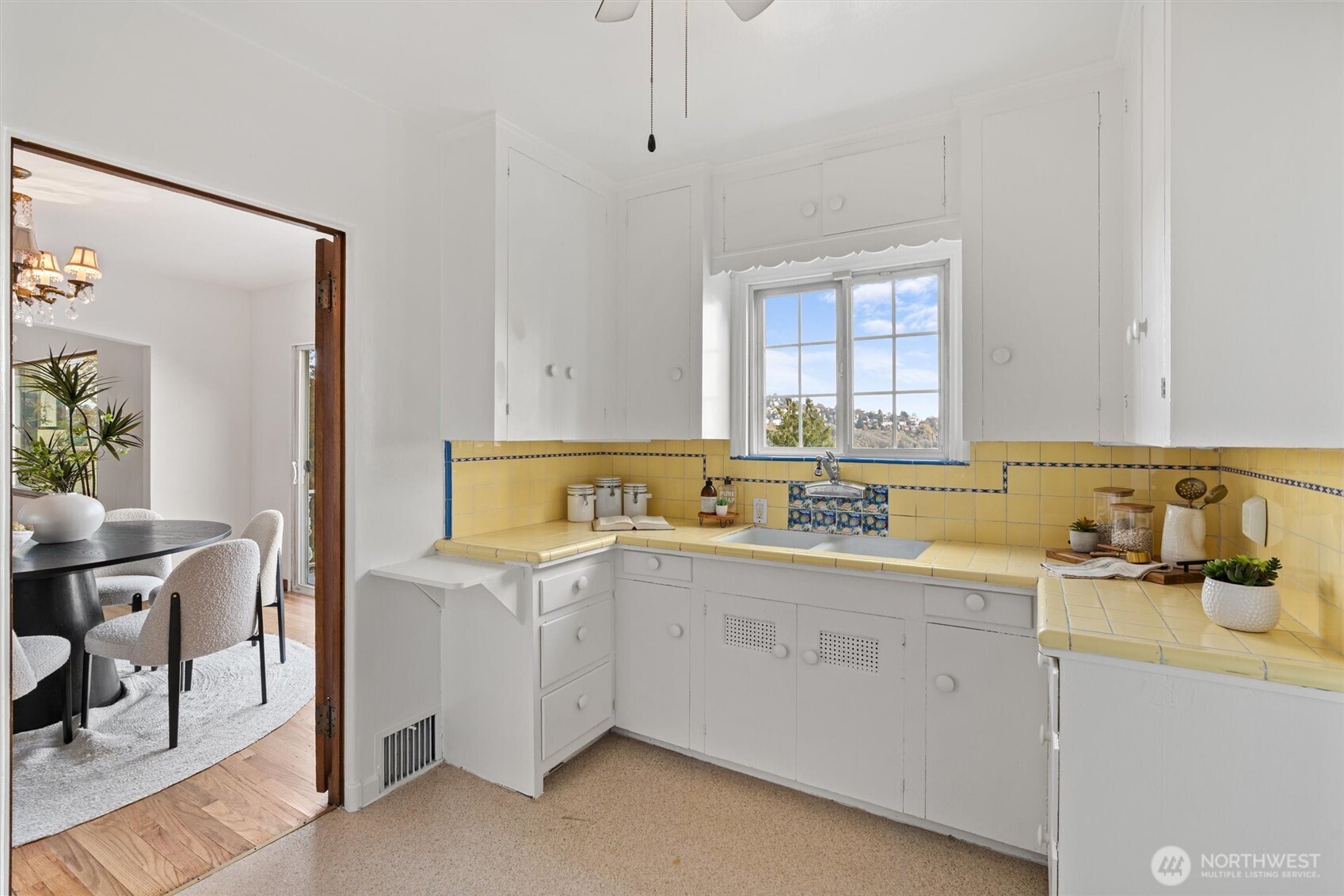 1820 Magnolia Way West Seattle, WA 98199 - Photo 7 of 33 a view of a kitchen with sink and window