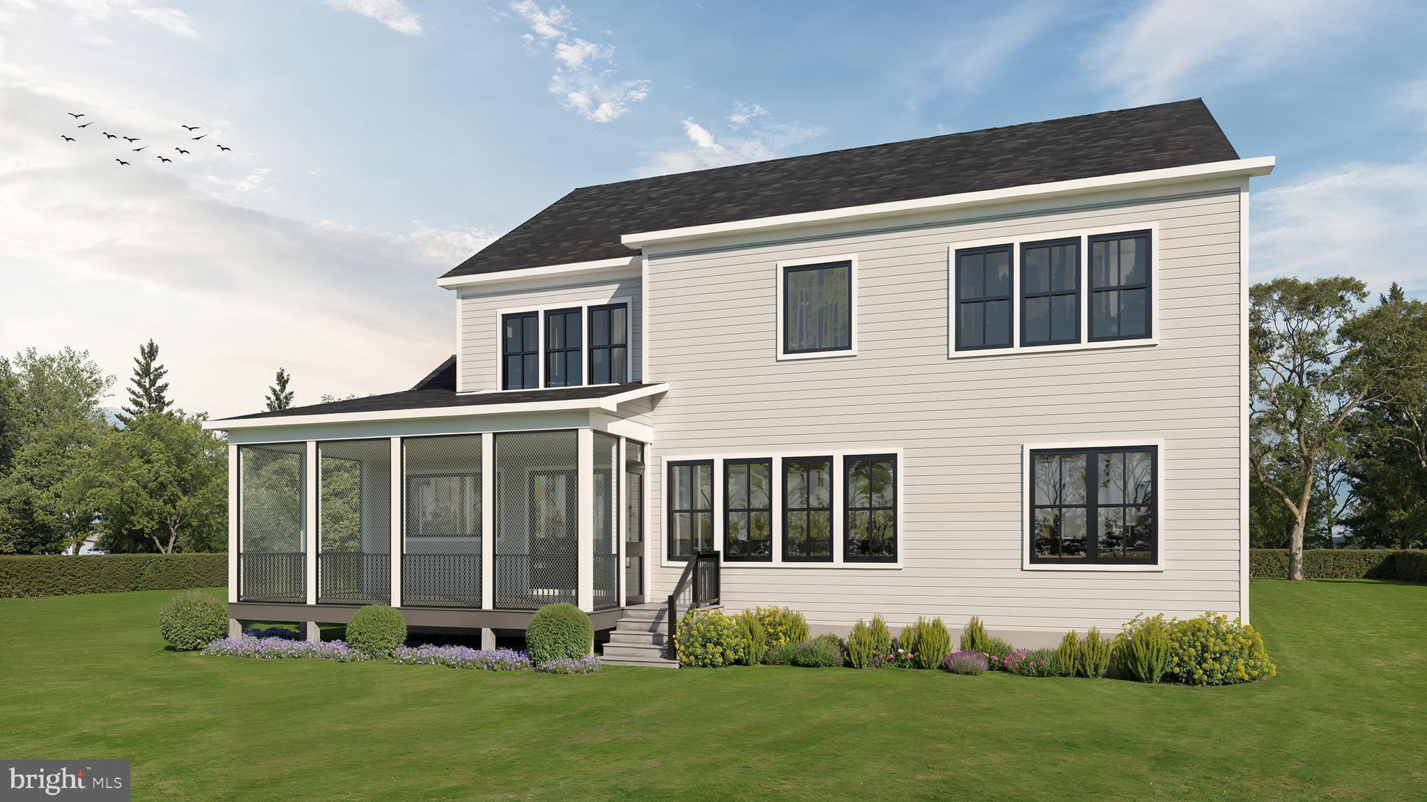 1822 North Kenmore Street Arlington, VA 22207 - Photo 2 of 6 a front view of a house with a yard and porch