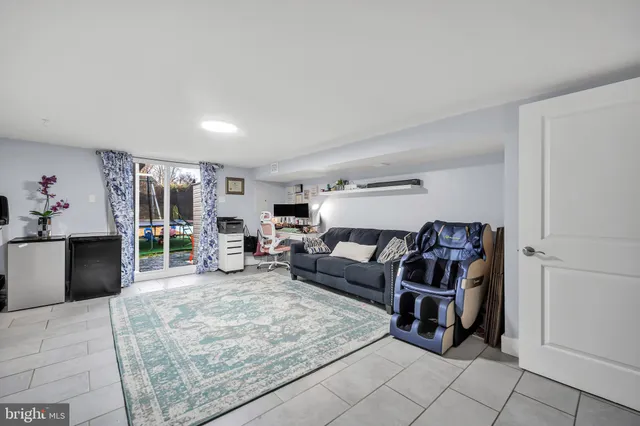 a living room with furniture and a couch