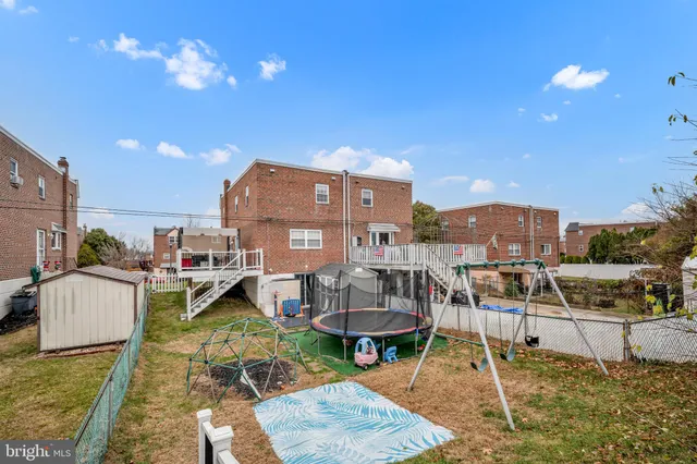 a view of a chairs and table in the patio