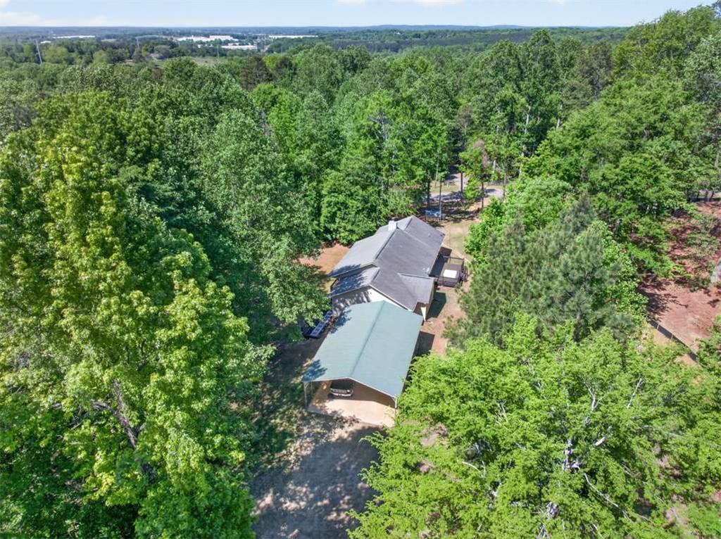 386 Ridgewood Drive Pendergrass, GA 30567 - Photo 46 of 50 an aerial view of a house with a yard