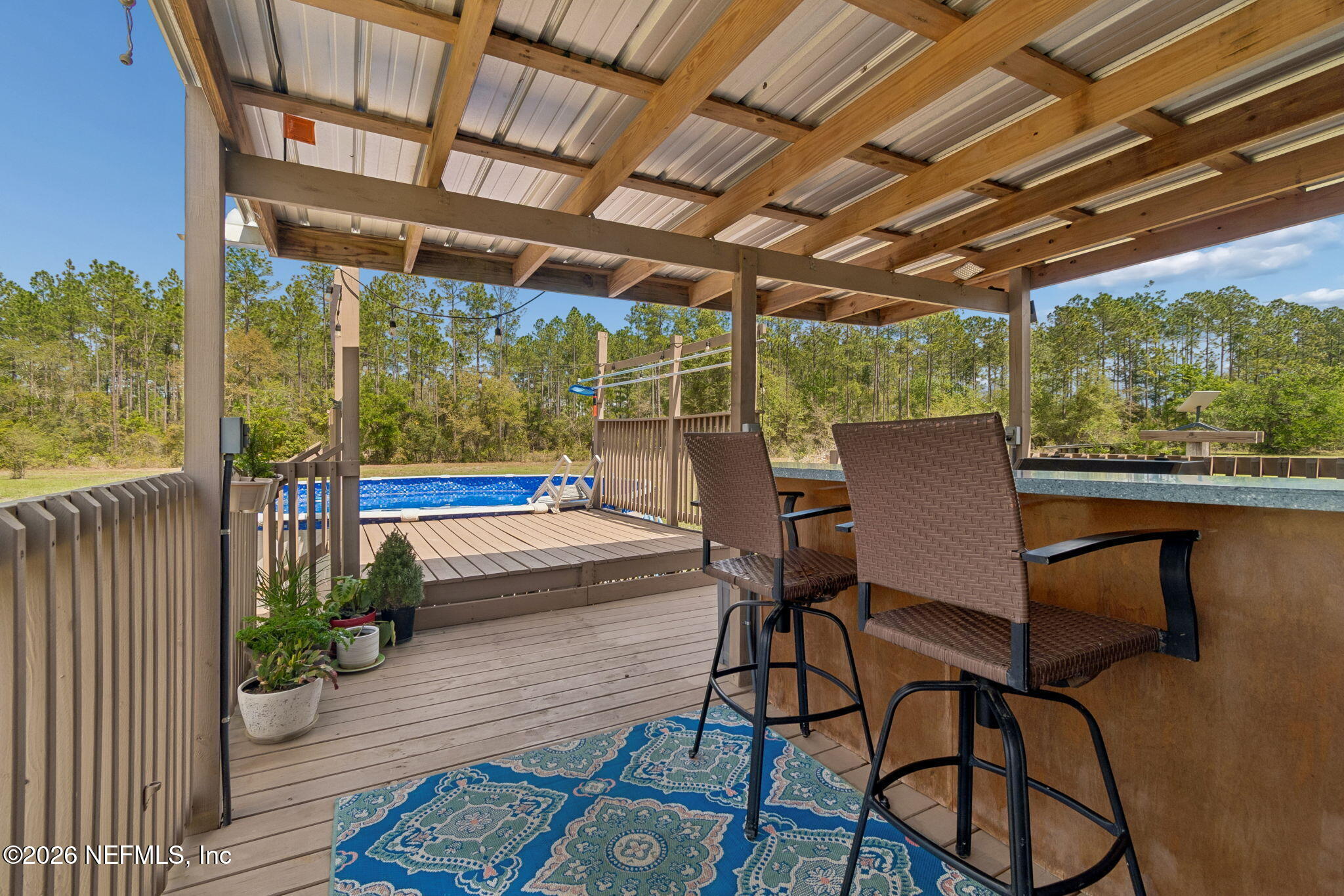 138 Bostwick Cemetery Road Palatka, FL 32177 - Photo 32 of 47 Covered Deck with Bar