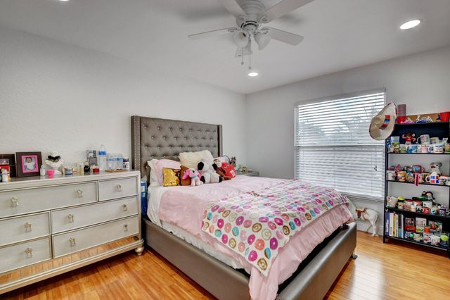 a bedroom with a bed and closet