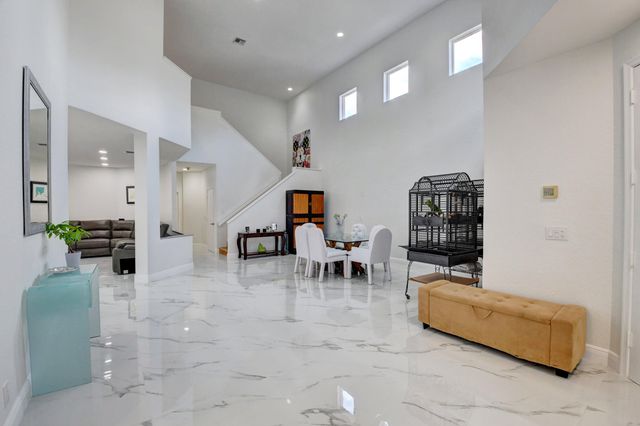 a view of a livingroom with furniture and a couch