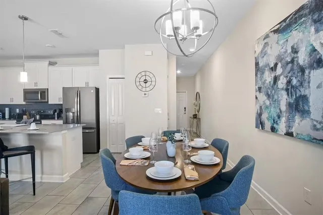a view of a dining room with furniture