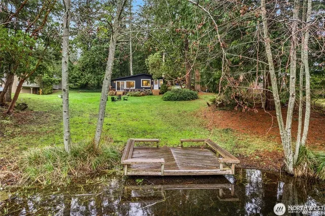 a view of a yard with furniture