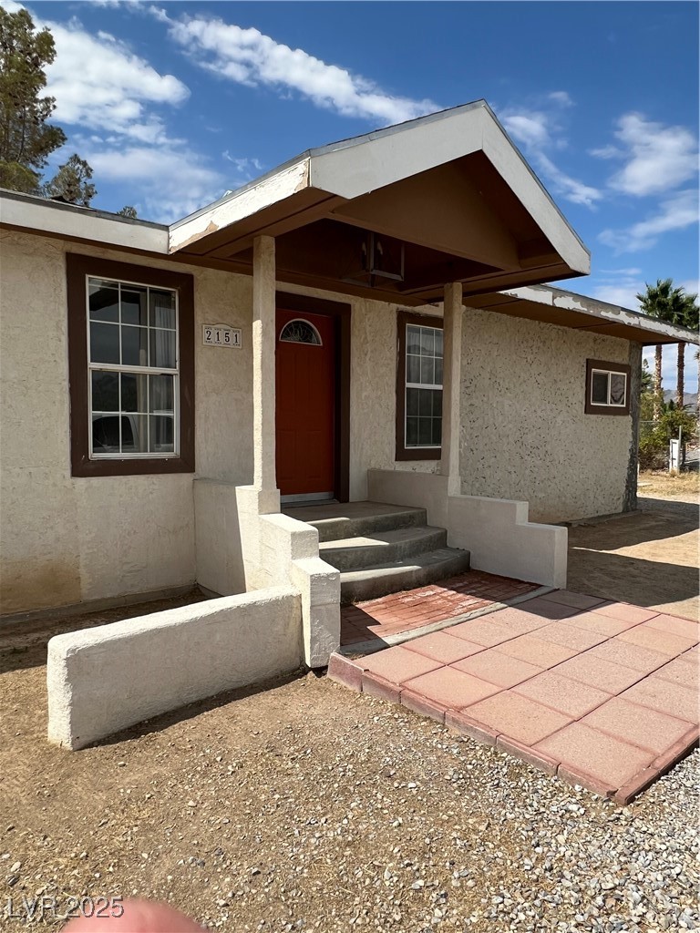 2151 West Simkins Road Pahrump, NV 89060 - Photo 3 of 23 Property entrance with stucco siding