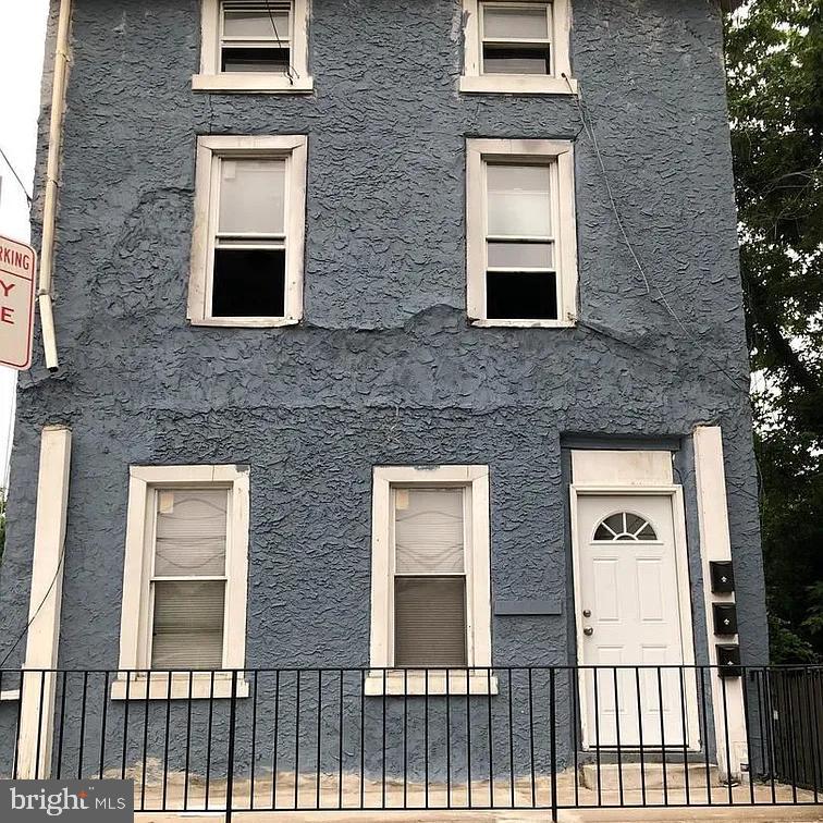 501 East Haines Street, Unit 3 Philadelphia, PA 19144 - Photo 2 of 6 a front view of a house with a brick wall