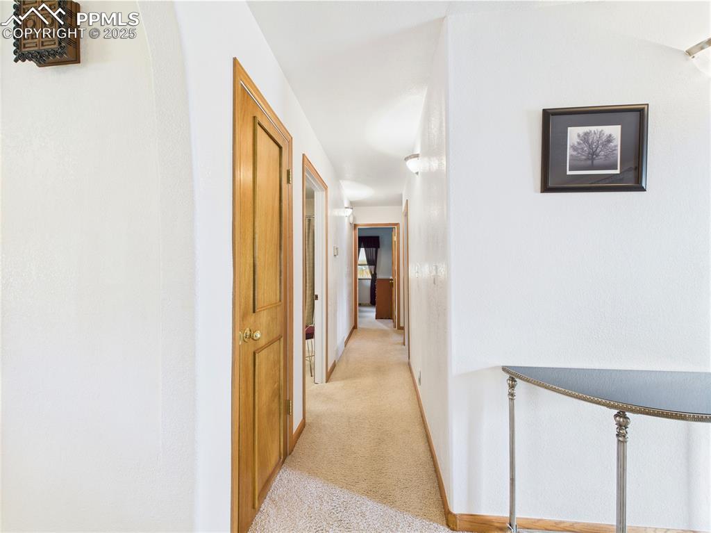 32006 Ford Road Pueblo, CO 81006 - Photo 23 of 50 a view of a hallway with a large window