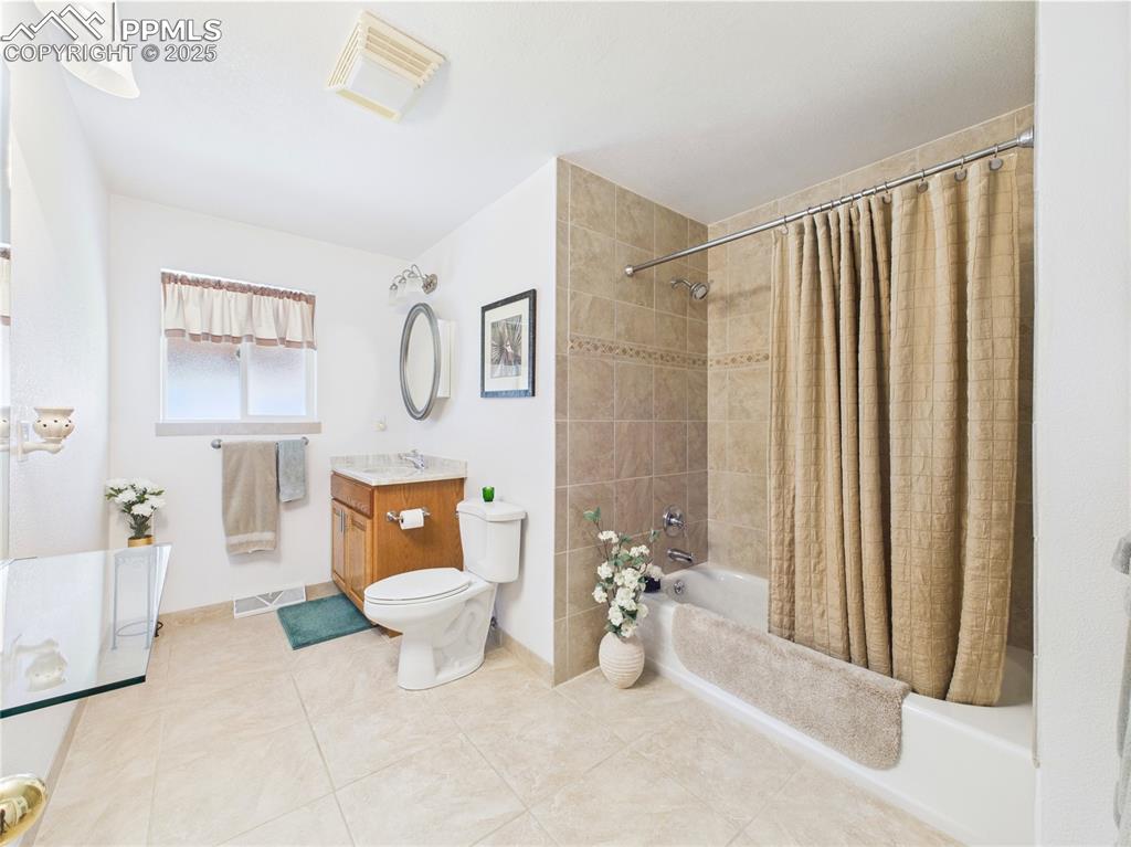 32006 Ford Road Pueblo, CO 81006 - Photo 4 of 50 a bathroom with a sink a toilet and shower