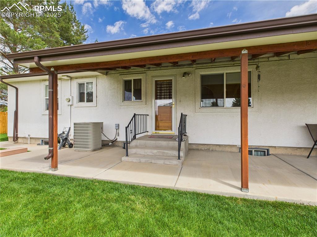 32006 Ford Road Pueblo, CO 81006 - Photo 47 of 50 a view of a house with backyard and porch