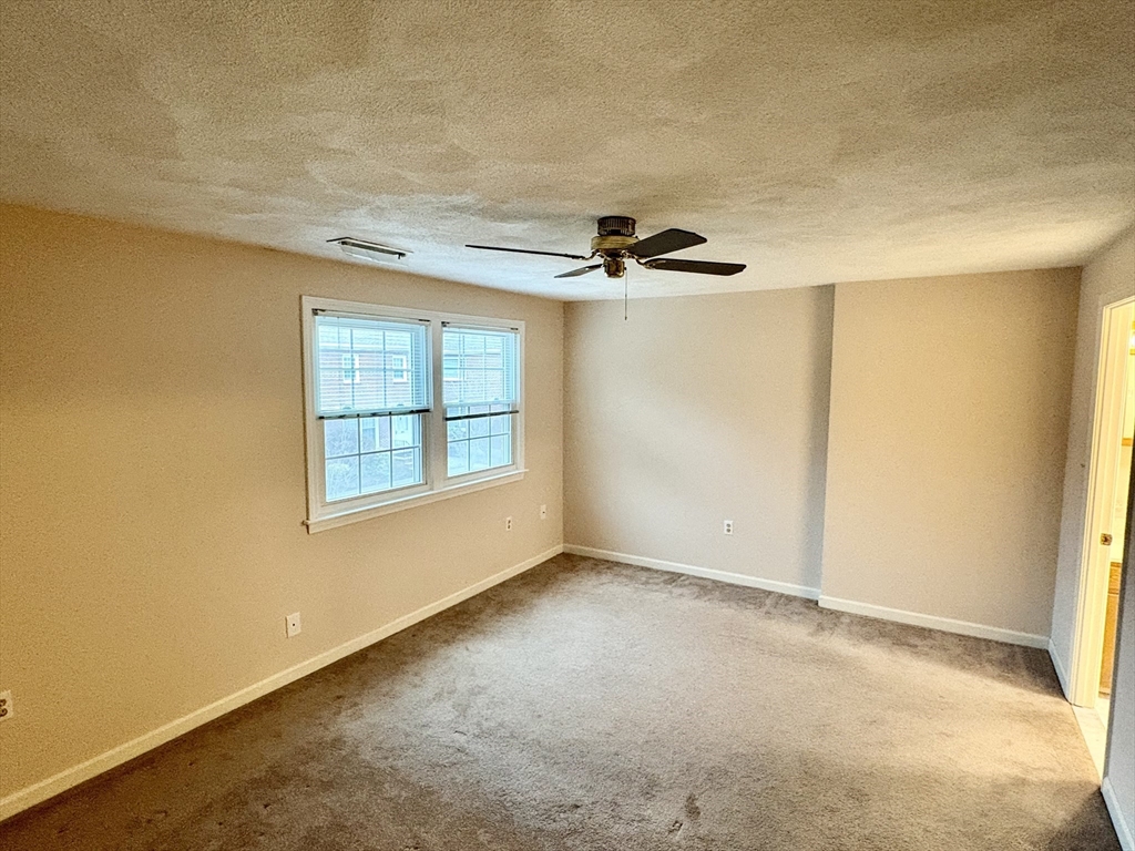 224 Park Street, Unit B2 Stoneham, MA 02180 - Photo 18 of 35 a view of an empty room with a window