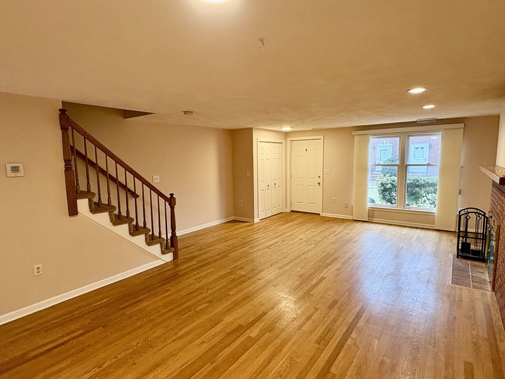 224 Park Street, Unit B2 Stoneham, MA 02180 - Photo 7 of 35 a view of an entryway with wooden floor