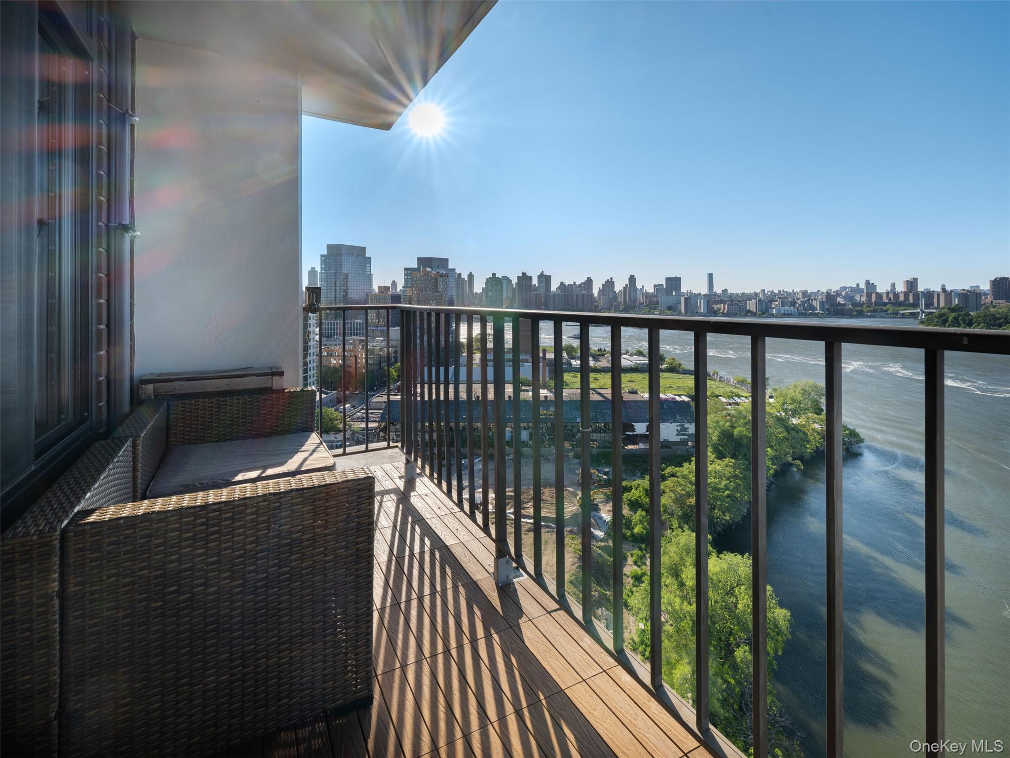 25-40 Shore Boulevard, Unit 17K Queens, NY 11102 - Photo 2 of 19 a view of a balcony with city view