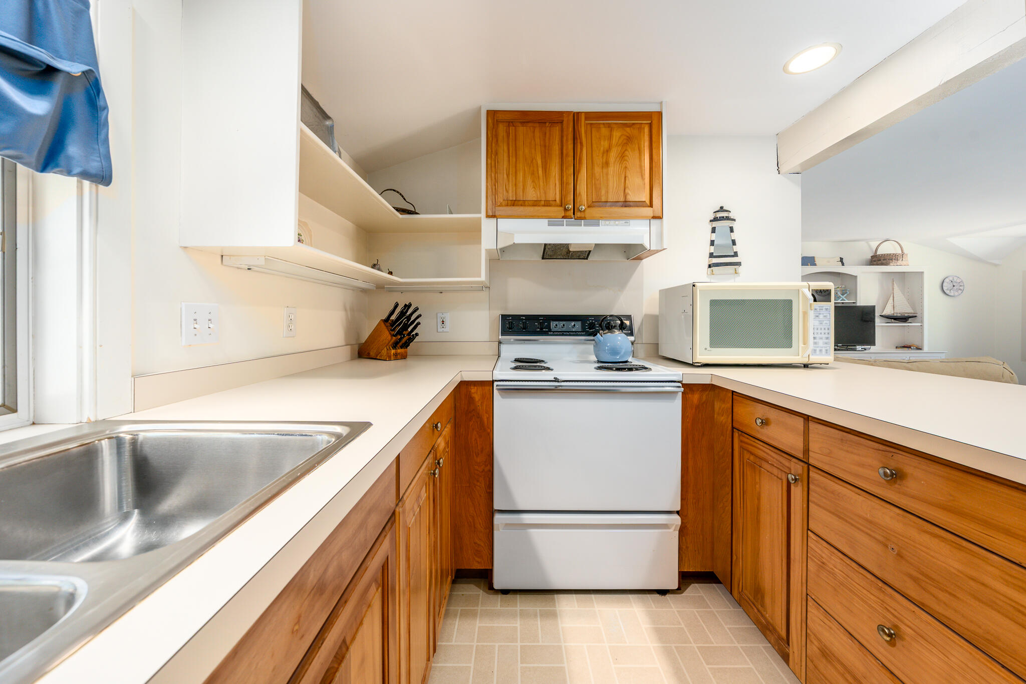 46 Great Bay Road Osterville, MA 02655 - Photo 28 of 54 a kitchen with stainless steel appliances granite countertop a sink stove and refrigerator