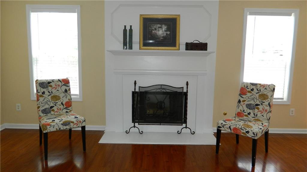2760 Rusticwood Drive Southwest Snellville, GA 30078 - Photo 12 of 50 a living room with furniture and a fireplace