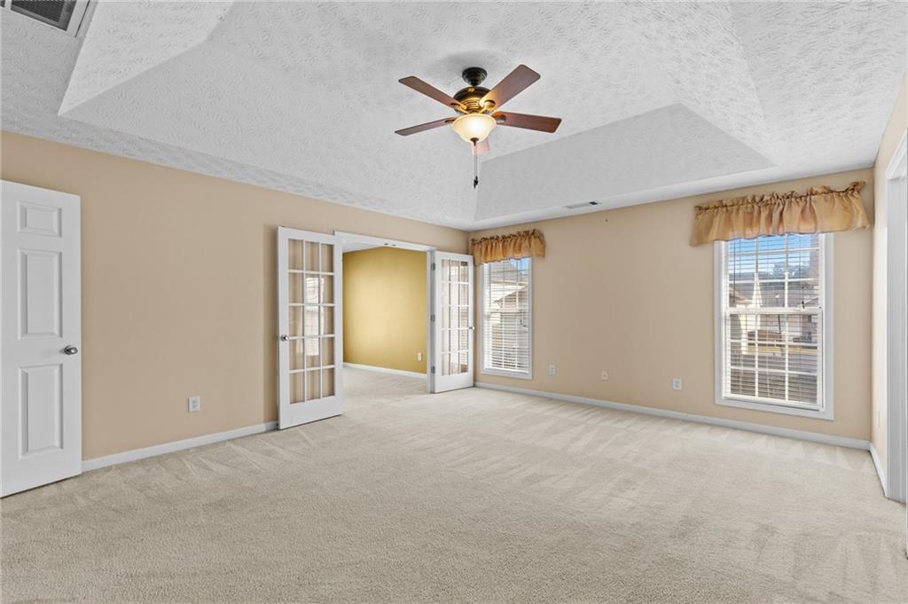2760 Rusticwood Drive Southwest Snellville, GA 30078 - Photo 21 of 50 a view of an empty room with a window