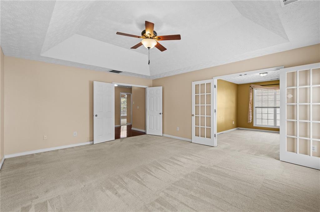 2760 Rusticwood Drive Southwest Snellville, GA 30078 - Photo 22 of 50 a view of an empty room with a window