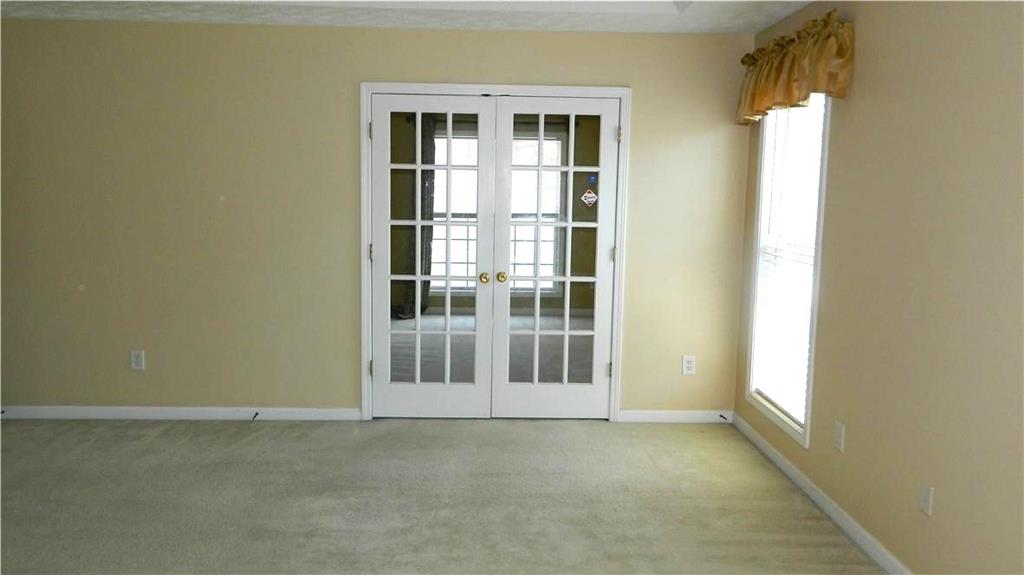 2760 Rusticwood Drive Southwest Snellville, GA 30078 - Photo 24 of 50 a view of an empty room with a window