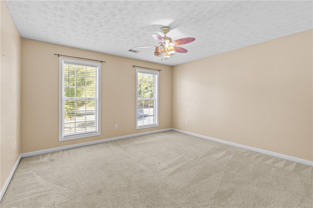 2760 Rusticwood Drive Southwest Snellville, GA 30078 - Photo 31 of 50 an empty room with a window