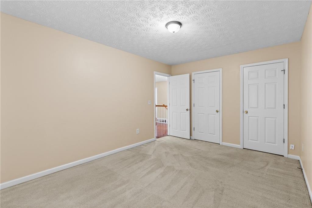 2760 Rusticwood Drive Southwest Snellville, GA 30078 - Photo 37 of 50 a view of an empty room