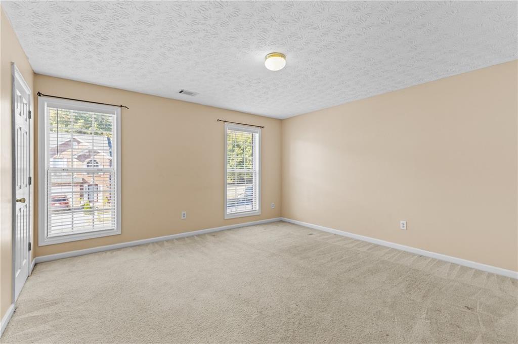 2760 Rusticwood Drive Southwest Snellville, GA 30078 - Photo 38 of 50 a view of an empty room with a window